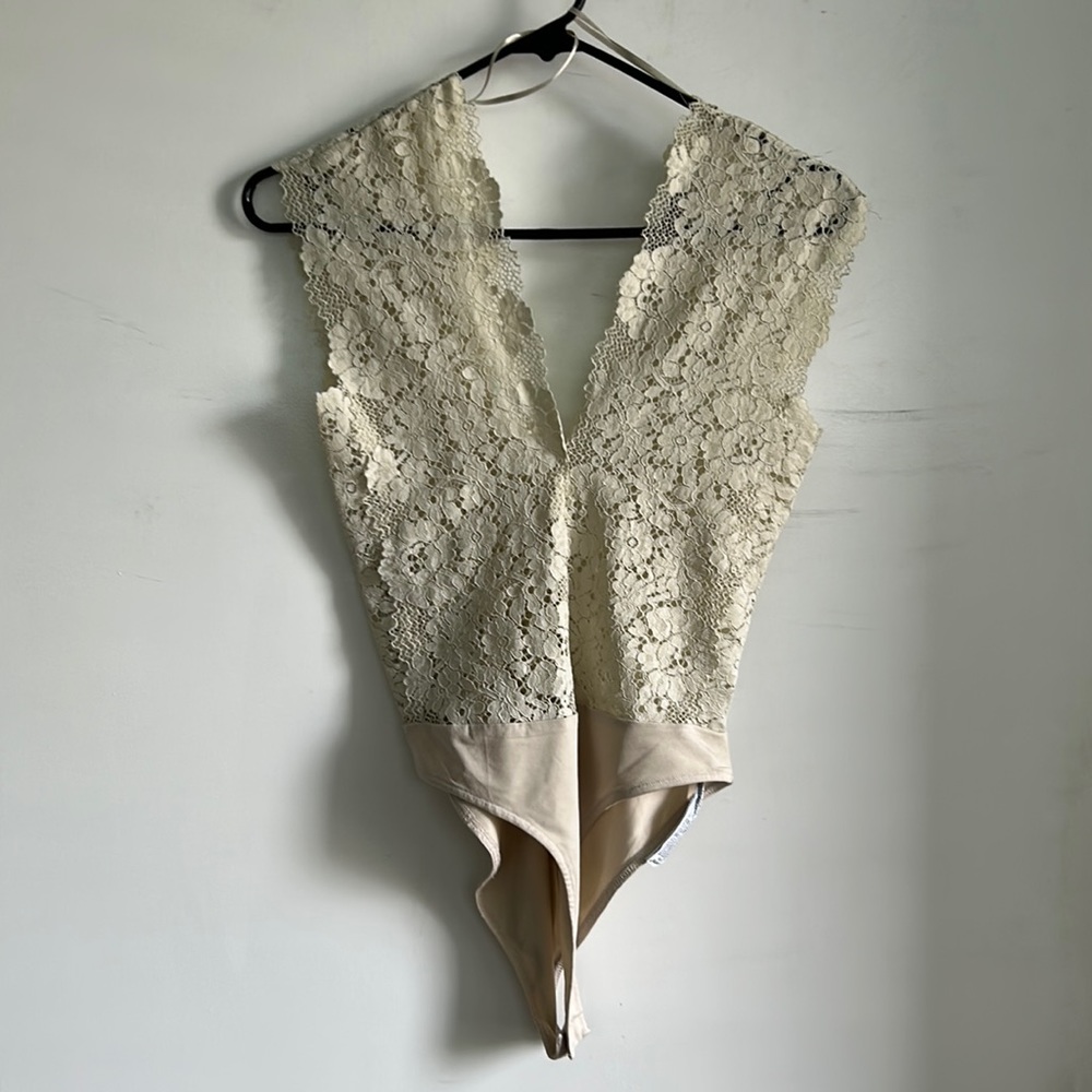 Has not been worn. It is small for me.